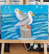 two sea gulls folk art painting on easel