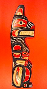 red bear wood carving by Cody Mathias of Squamish Nation